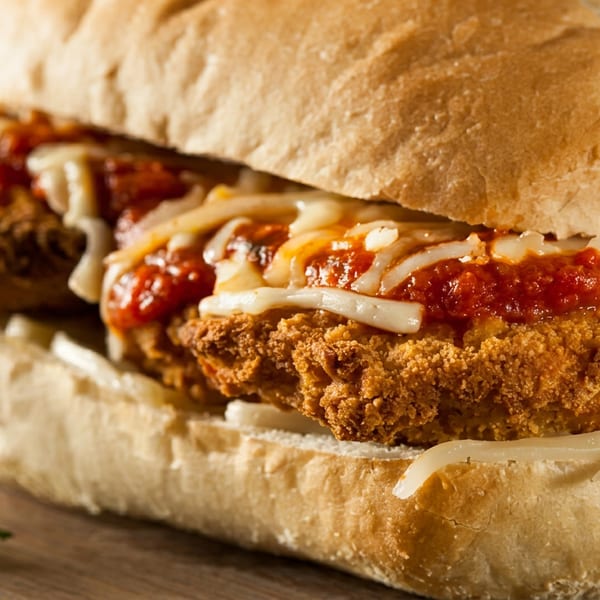Crispy chicken cutlets topped with marinara sauce and melted cheese on a toasted sub roll.